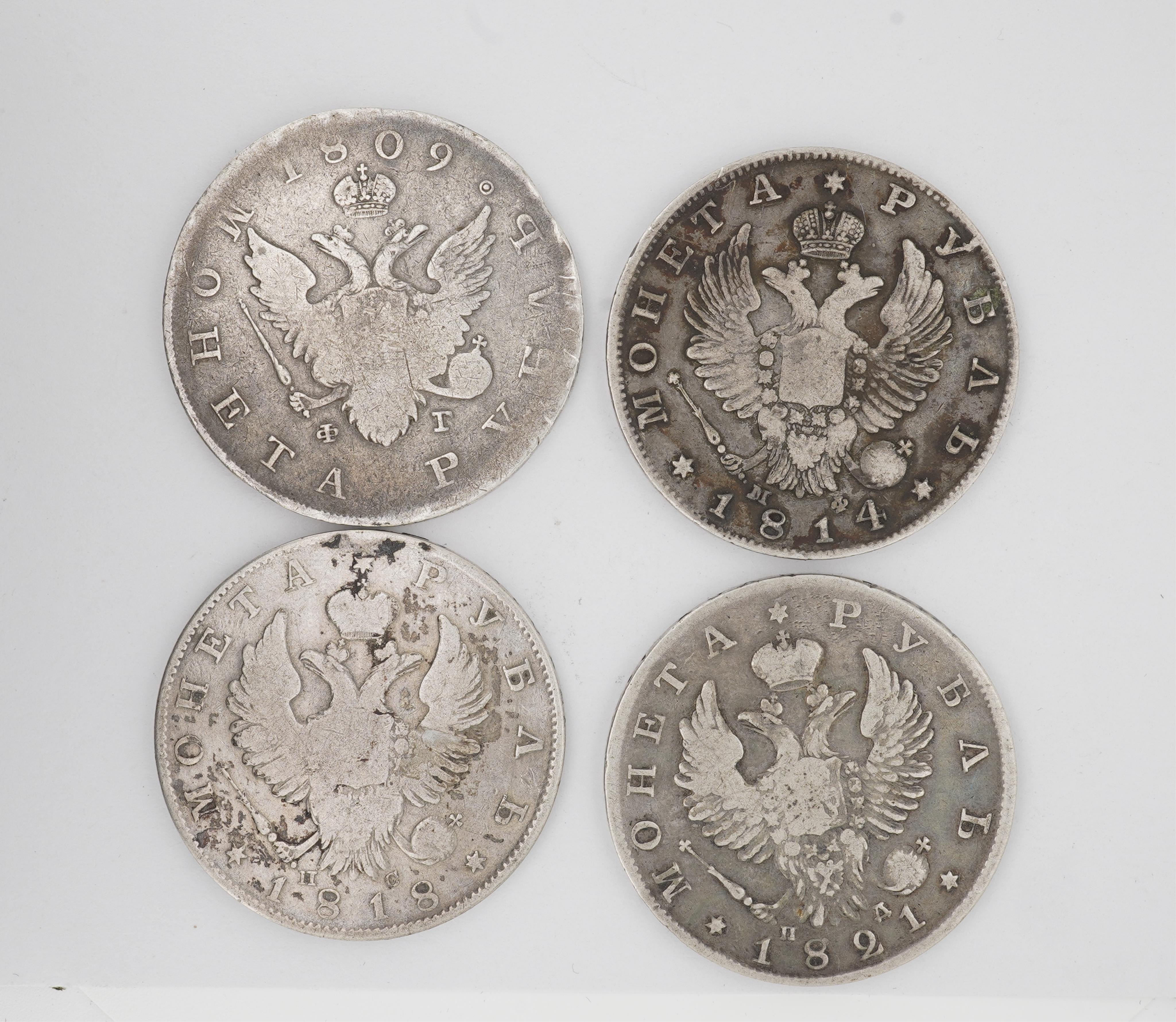 Russian silver coins, Alexander I (1801-25), four 1 rouble coins, 1809, 1814, near VF, 1818, fine, 1821, fine or better